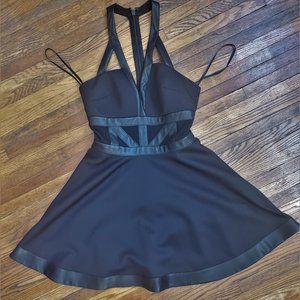 EDGY BEBE SKATER DRESS WITH LEATHER DETAILS
